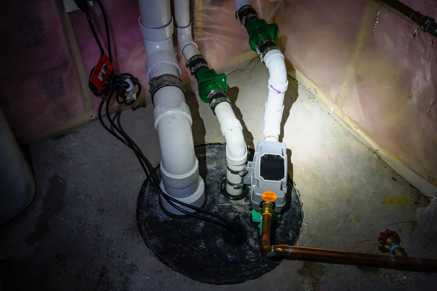 Installed sump pump system in a basement