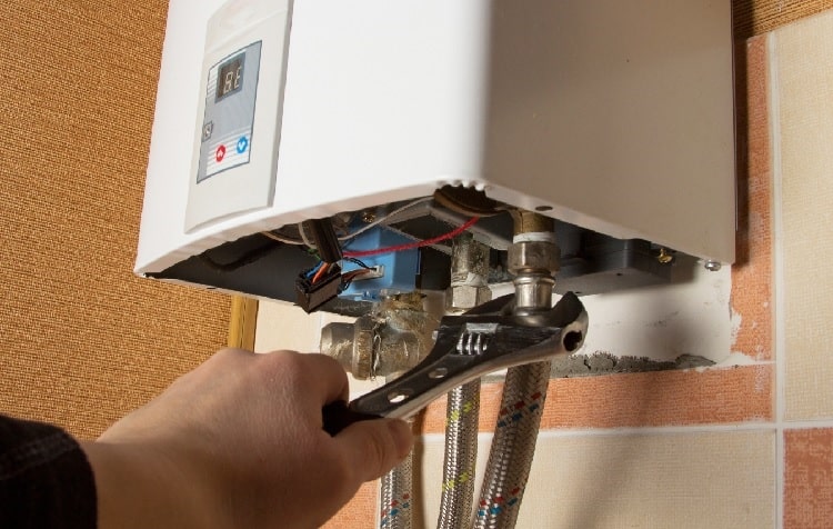 Plumber Installing Tankless Water Heater